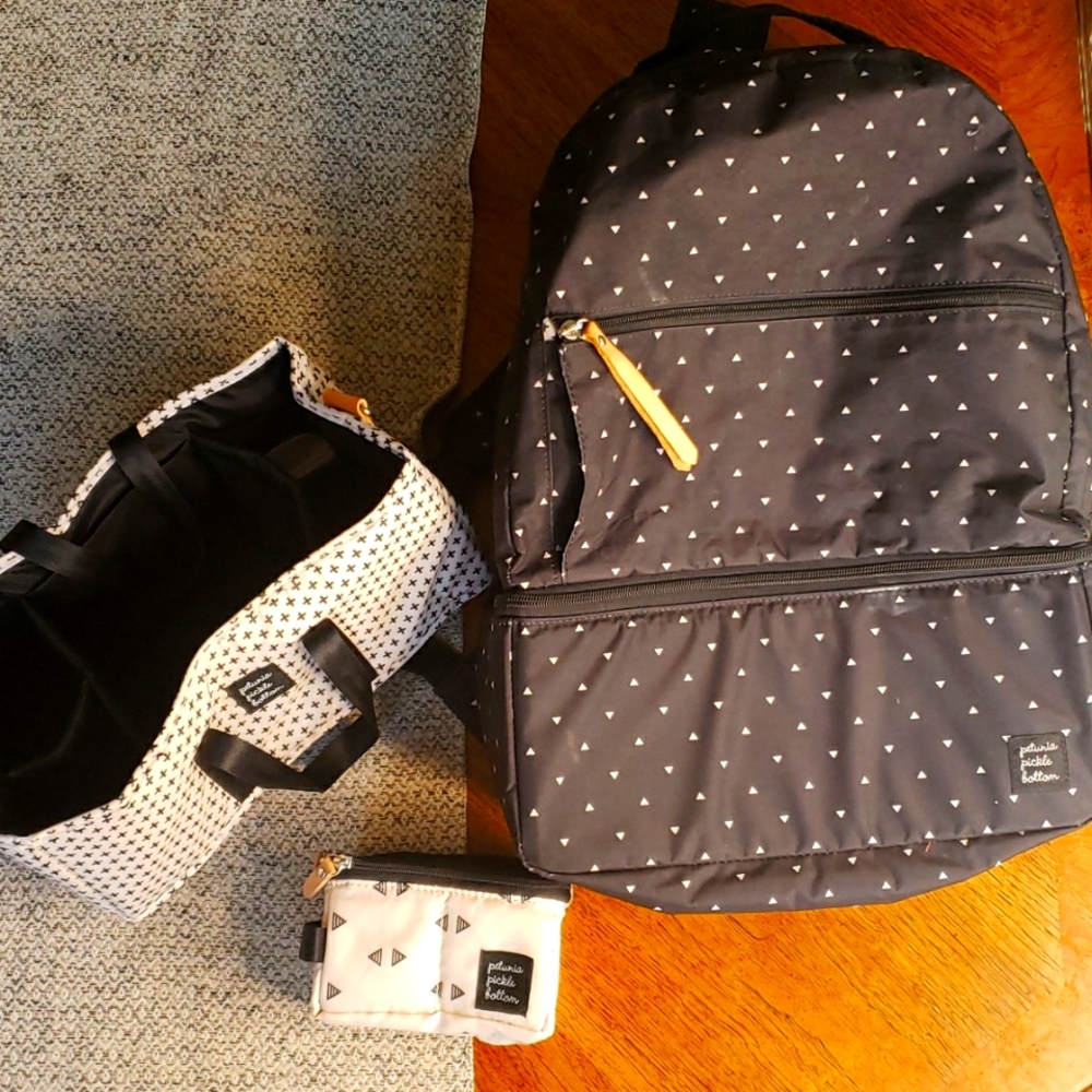 Petunia Pickle Bottom 'Axis' Diaper Bag Backpack with extra accessories.